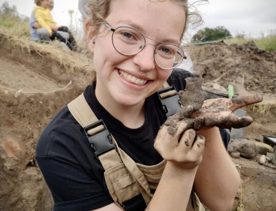 Student Emily Finds Medieval Pilgrims Ampulla